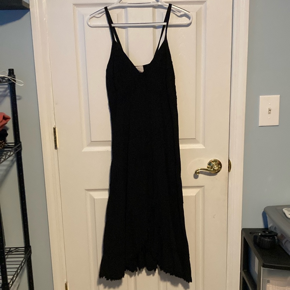 Giocam all black size Large dress with design.